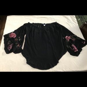 Off the shoulder, floral sleeve black top